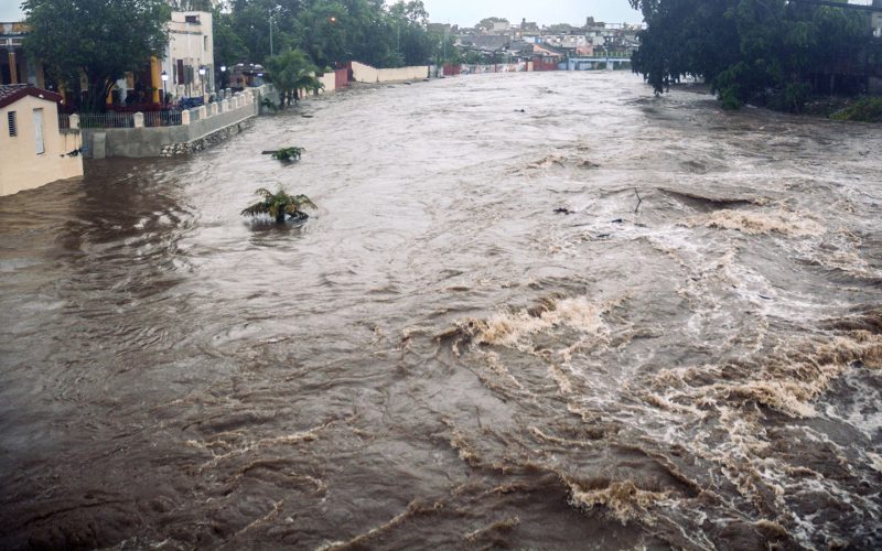 This handout picture released by the Cuban News Agency shows a river overflowing its banks due to heavy rains associated with subtropical storm Alberto, on May 28, 2018, Sancti Spiritus province. (Photo by STR / ACN / AFP)        (Photo credit should read STR/AFP/Getty Images)
